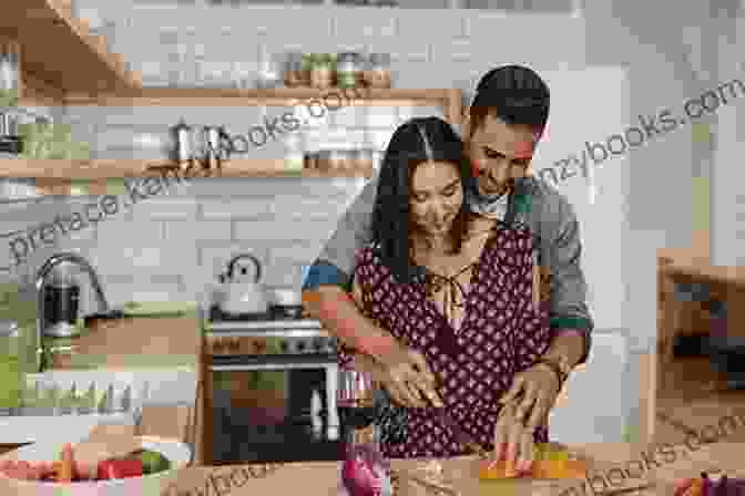 A Couple Cooking Together In A Modern Kitchen, Smiling And Chopping Vegetables. The Paleo Cookbook For Two: 100 Perfectly Portioned Recipes